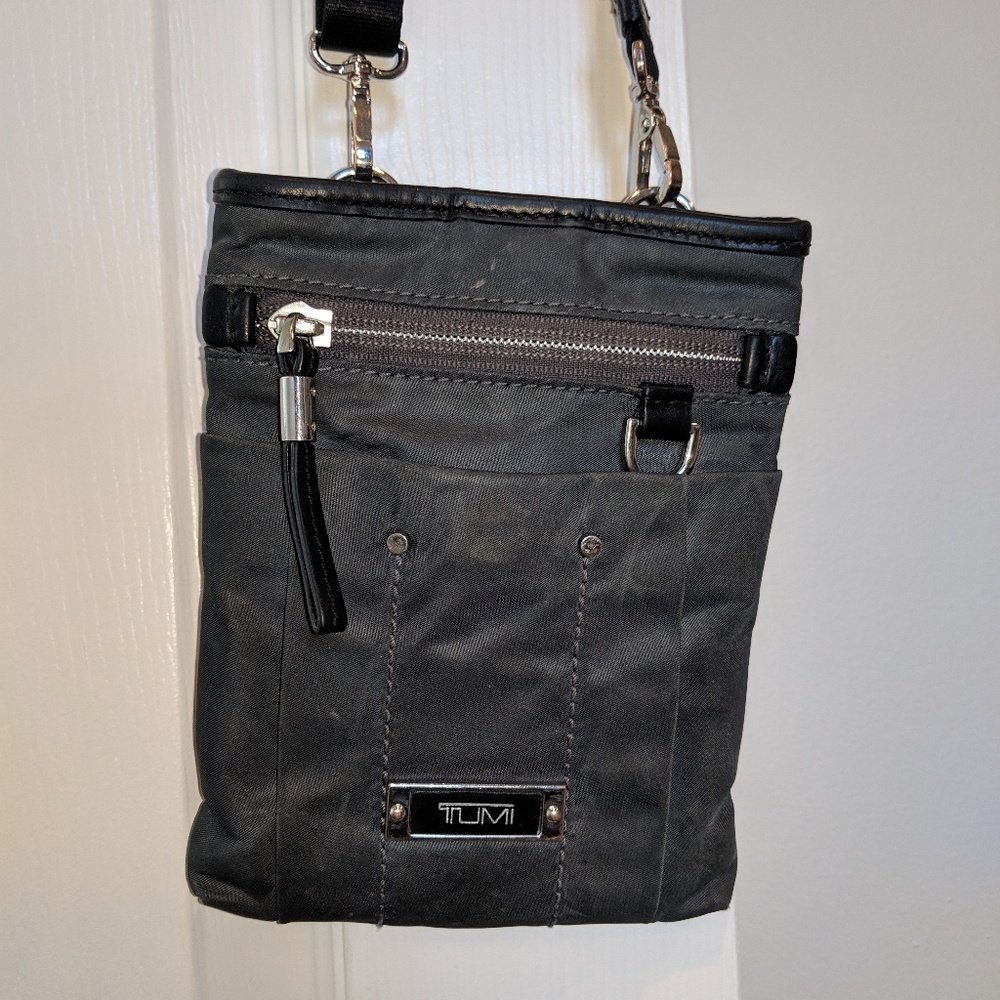 Tiny tumi travel bag.